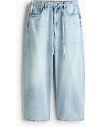 H&M - Wide Regular Waist Ankle Jeans - Lyst