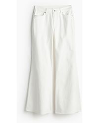 H&M - Flared Regular Jeans - Lyst