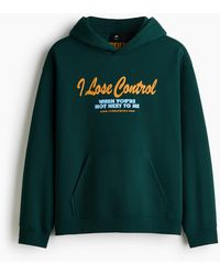 H&M - Bedruckter Hoodie in Loose Fit - Lyst