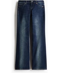 H&M - Flared Ultra Low Waist Jeans - Lyst