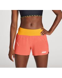 Hoka One One Glide Shorts, 10 cm für Damen in Camellia Größe XL | Shorts - Orange