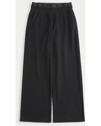 Hollister - Logo Waist Fleece Wide-leg Pants - Lyst