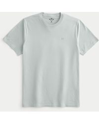 Hollister - T-Shirt mit Rundhalsausschnitt und Symbol - Lyst