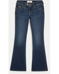 Hollister - Low-rise Dark Wash Tab Waist Bootcut Jeans - Lyst