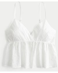 Hollister - Lässiges, glänzendes Babydoll-Oberteil mit Stickerei - Lyst