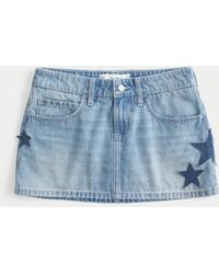 Hollister - Low-rise Medium Wash Star Applique Denim Mini Skort - Lyst