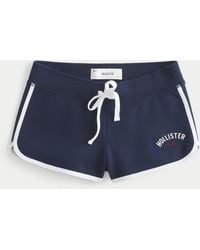Hollister - Ultra Low-rise Logo Graphic Fleece Shortie Shorts - Lyst