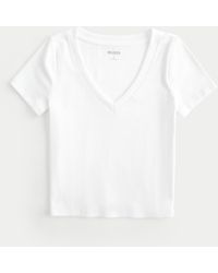 Hollister - Geripptes T-Shirt mit V-Ausschnitt - Lyst