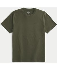Hollister - Baumwoll-T-Shirt mit Rundhalsausschnitt und Symbol - Lyst