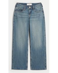 Hollister - Low Rise Baggy Jeans in mittlerer Waschung mit Los Angeles-Grafik - Lyst