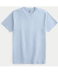 Hollister - Baumwoll-T-Shirt mit Rundhalsausschnitt und Symbol - Lyst