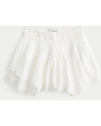 Hollister - Chiffon Tiered Asymmetrical Hem Mini Skort - Lyst