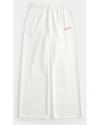 Hollister - Jogginghose mit weitem Bein und Hundegrafik - Lyst