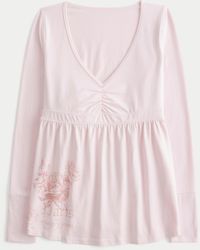 Hollister - Long-sleeve Pinch Bust Graphic Babydoll Top - Lyst