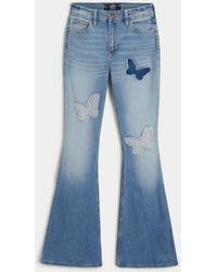 Hollister - High-rise Medium Wash Butterfly Patch Flare Jeans - Lyst