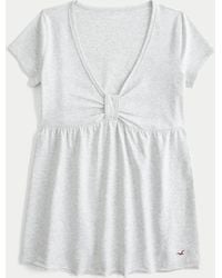 Hollister - Kurzärmliges Babydoll-Oberteil in Easy Fit - Lyst