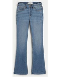 Hollister - Curvy Mid-rise Medium Wash Boot Jeans - Lyst
