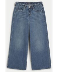 Hollister - Low-rise Medium Wash Super Baggy Jeans - Lyst