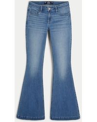 Hollister - Low-rise Medium Wash Flare Jeans - Lyst