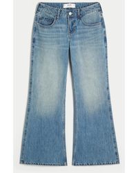 Hollister - Low Rise Baggy Flare Jeans in mittlerer Waschung - Lyst