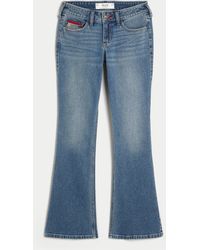 Hollister - Low-rise Medium Wash Embroidered Flag Bootcut Jeans - Lyst