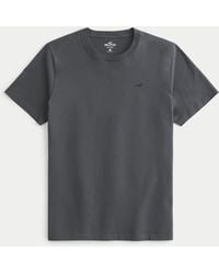 Hollister - T-Shirt mit Rundhalsausschnitt und Symbol - Lyst