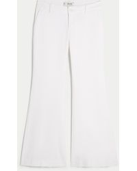 Hollister - Low-rise Linen-blend Baggy Flare Pants - Lyst