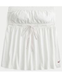 Hollister - Strapless Tie Waist Babydoll Top - Lyst