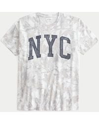 Hollister - Oversized Tee mit NYC-Grafik und Camo-Muster - Lyst
