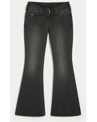 Hollister - Adjustable Waist Ultra Low-rise Washed Black Back Buckle Flare Jeans - Lyst