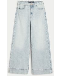Hollister - Ultra High-rise Light Wash Wide-leg Jeans - Lyst