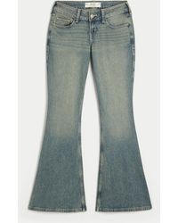 Hollister - Ultra Low-rise Medium Wash Flare Jeans - Lyst