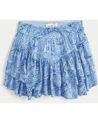 Hollister - Gestufter Miniskort mit asymmetrischem Saum - Lyst