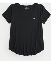 Hollister - Lässiges T-Shirt mit V-Ausschnitt und Symbol - Lyst