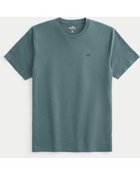 Hollister - T-Shirt mit Rundhalsausschnitt und Symbol - Lyst