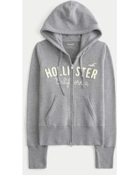 Hollister - Hollister Feel Good Zip-up Logo Graphic Hoodie - Lyst