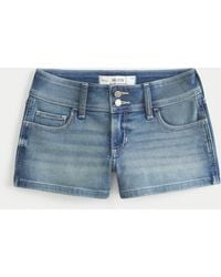Hollister - Low-rise Medium Wash Shortie Shorts - Lyst