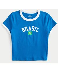 Hollister - Baby-Tee mit Brasilien-Grafik - Lyst