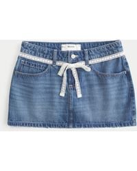 Hollister - Low-rise Medium Wash Embroidered Denim Mini Skort - Lyst