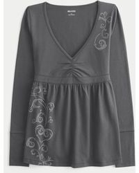 Hollister - Long-sleeve Pinch Bust Graphic Babydoll Top - Lyst