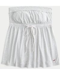 Hollister - Strapless Tie Waist Babydoll Top - Lyst