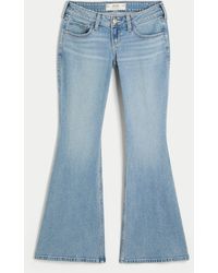 Hollister - Ultra Low-rise Medium Wash Flare Jeans - Lyst