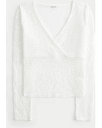 Hollister - Lace Long-sleeve Wrap-front Top - Lyst
