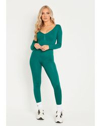 Missy Empire - Seamless Long Sleeve Plunge Jumpsuit - Lyst