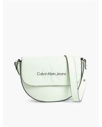 Calvin Klein - Sculpted Saddle Bag Mono - Lyst