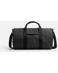 COACH - Theo Signature Jacquard Duffle Holdall - Lyst