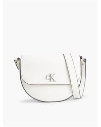 Calvin Klein - Monogram Saddle Crossbody Bag - Lyst