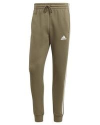 adidas - Essentials Fleece Tapered Cuff 3-stripes joggers M - Lyst