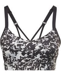 Reebok - Lux Speckle Modern Safari Strappy Medium Impact Sports Bra - Lyst