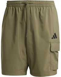 adidas - Essentials Small Logo Cargo Chelsea Shorts - Lyst